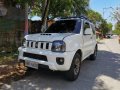 Pearl White Suzuki Jimny 2018 for sale in Quezon -5