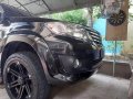 Selling Black Toyota Fortuner 2013 in Angono-0