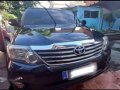 Selling Black Toyota Fortuner 2013 in Angono-7