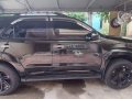 Selling Black Toyota Fortuner 2013 in Angono-3