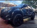 Selling Black Toyota Fortuner 2013 in Angono-8