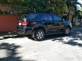 Selling Black Toyota Fortuner 2006 in Makati-0