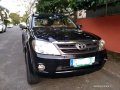 Selling Black Toyota Fortuner 2006 in Makati-6