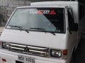 Selling White Mitsubishi L300 2018 in Marilao-0