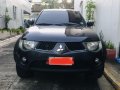 Selling Black Mitsubishi Strada 2009 in Manila-8