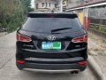Selling Black Hyundai Santa Fe 2015 in Cebu -5