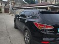 Selling Black Hyundai Santa Fe 2015 in Cebu -5