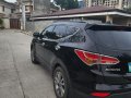 Selling Black Hyundai Santa Fe 2015 in Cebu -4