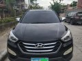 Selling Black Hyundai Santa Fe 2015 in Cebu -1