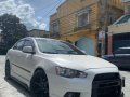 White Mitsubishi Lancer 2010 for sale in Quezon City-0