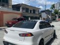White Mitsubishi Lancer 2010 for sale in Quezon City-5