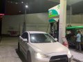 White Mitsubishi Lancer 2010 for sale in Quezon City-2