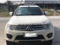 Need to sell Pearl white 2014 AT Mitsubishi Montero Sport SUV / Crossover second hand-0