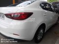 Second hand White 2016 Mazda 2  SKYACTIV S Sedan AT for sale-0