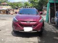 Sell 2nd hand 2014 Hyundai Tucson SUV / Maroon-1