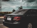 RUSH Toyota Corolla Altis 1.6E A/T Black-0