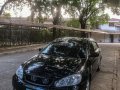 RUSH Toyota Corolla Altis 1.6E A/T Black-3