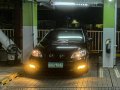 RUSH Toyota Corolla Altis 1.6E A/T Black-4