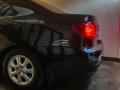 RUSH Toyota Corolla Altis 1.6E A/T Black-5