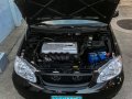 RUSH Toyota Corolla Altis 1.6E A/T Black-9