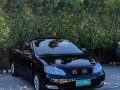 RUSH Toyota Corolla Altis 1.6E A/T Black-10