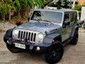 2019 Jeep Wrangler ULTD. JK SPORT TRIM HARD TOP A/T-5