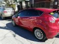 Selling Red 2016 Ford Fiesta Hatchback affordable price-0