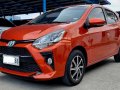 Orange 2023 Toyota Wigo Hatchback for sale-0