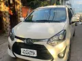  Selling White 2018 Toyota Wigo Hatchback by verified seller-0