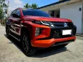 Pre-owned Orange 2023 Mitsubishi Strada Athlete 4WD AT for sale-1