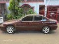 Mitsubishi Lancer MX Maroon, Model 2000 AT transmission-1