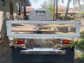 Isuzu elf truck dropside-2