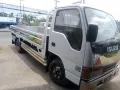 Isuzu elf truck dropside-0
