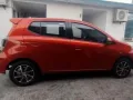 Orange 2023 Toyota Wigo Hatchback second hand for sale-3