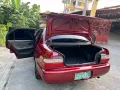 TOYOTA COROLLA GLi 1.6L M/T RED MICA-2