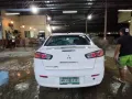 Selling White 2010 Mitsubishi Lancer Ex -1