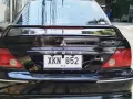 Mitsubishi Lancer 1.6 EX (with Original Ralliart Skirts and Spoiler)-2