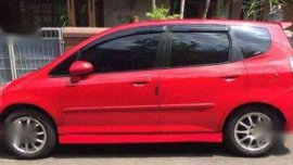 2008 Honda Jazz -Color-RED-side skirt-automatic