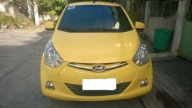 2015 yellow Hyundai Eon GLS mirage kia rio manual picanto mazda