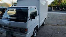 Mitsubishi L300 closed van model 2004