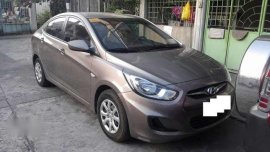 2013 Gray Hyundai Accent sedan eon mirage rio picanto alto mazda