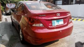 Mt Red Hyundai Accent 2013..
