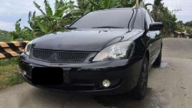 pyrenese black mitsubishi lancer 2012 1st own cebu plate lady driven