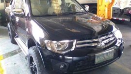 Mitsubishi Strada 2011 truckl black manual for sale 