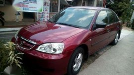 Honda Civic Dimension Red shiny and glossy 2003model