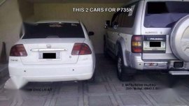 Cars Honda LXI and Pajero Exceed 2001
