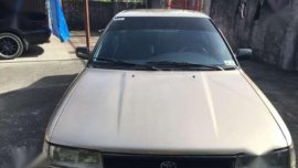 1992 toyota corolla golden brown and mistsubishi galant charcoalblack