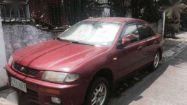 Mazda 323 red