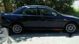 Honda city mazda 323