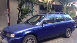 Blue Suzuki Esteem Wagon